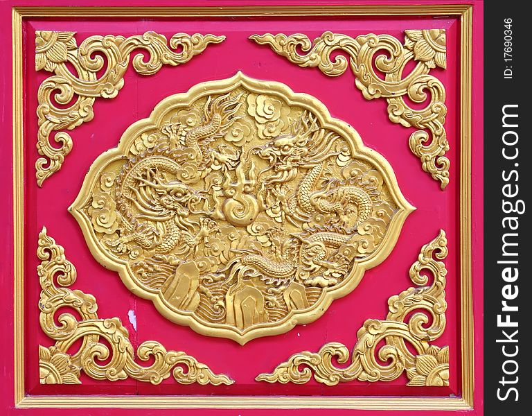 Chinese Dragon sculpture on the door of Chinese Temple
