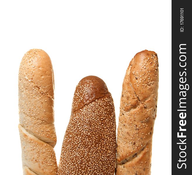 Three baguettes with sesame on a white background