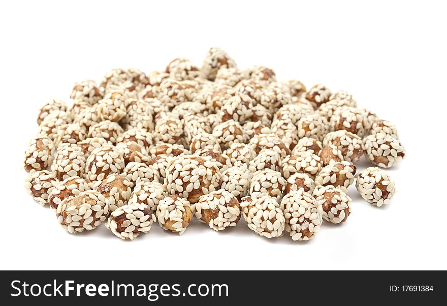 Peanuts with sesame on a white background