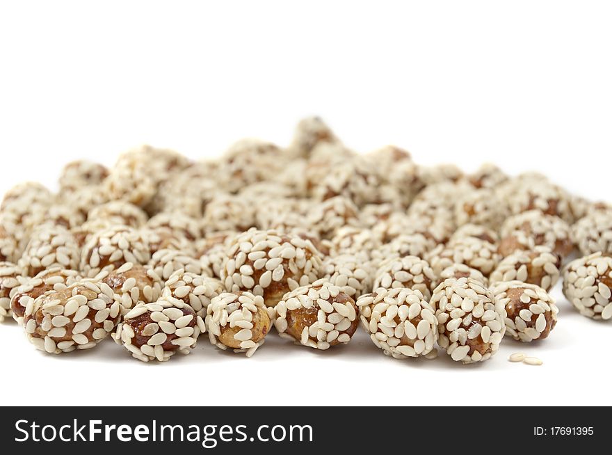 Peanuts with sesame on a white background