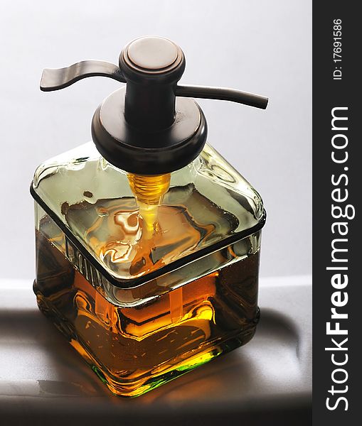 Close up isolated image of soap dispenser. Close up isolated image of soap dispenser