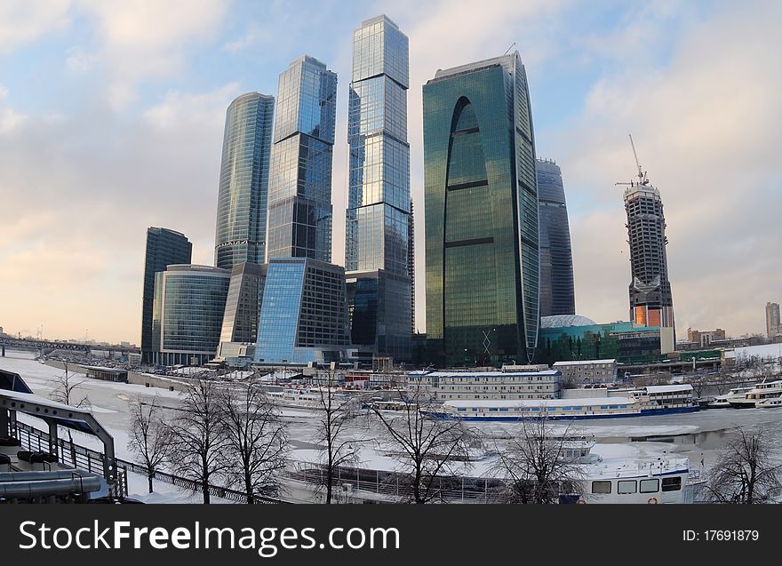 Citycsape with skyscrapers on a winter evening. Citycsape with skyscrapers on a winter evening