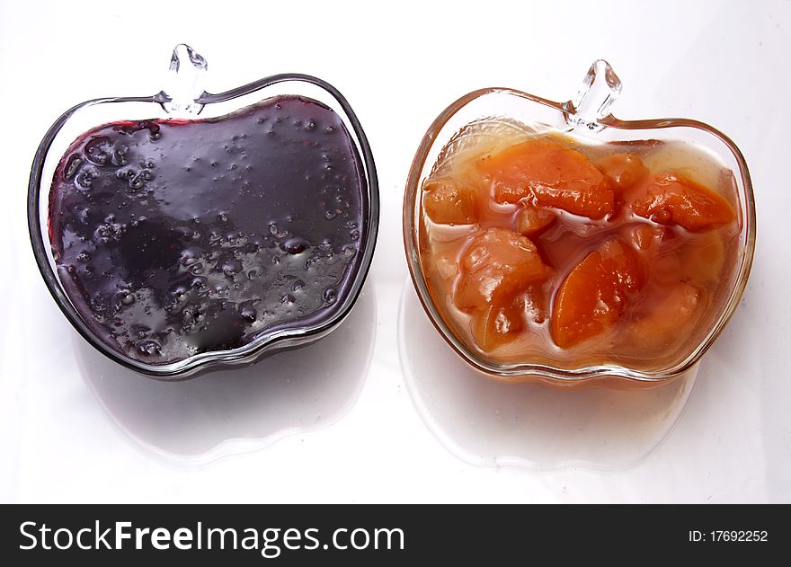 Fragrant fruit jam in a glass vase