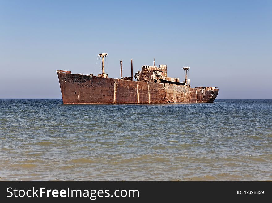 Rusty old ship on the sea