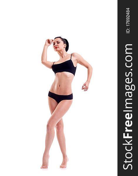 Full length of a bikini model stanting on a white background. Full length of a bikini model stanting on a white background