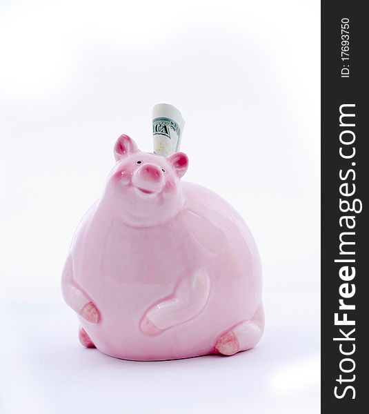 Piggy bank with dollars.