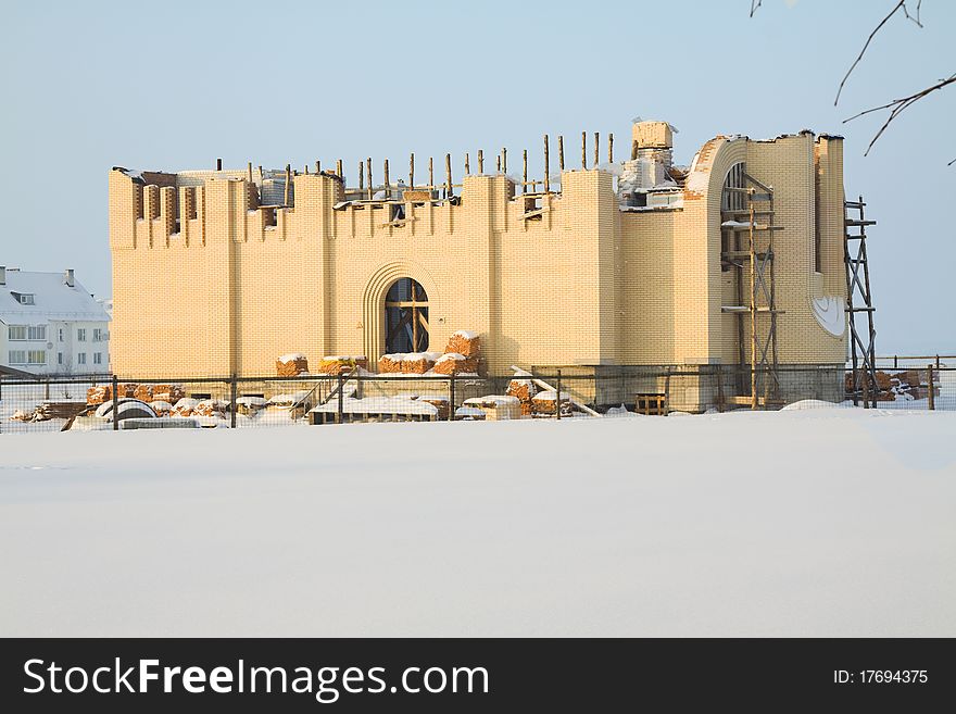 Building of a new religious structure (church) in winter time. Building of a new religious structure (church) in winter time