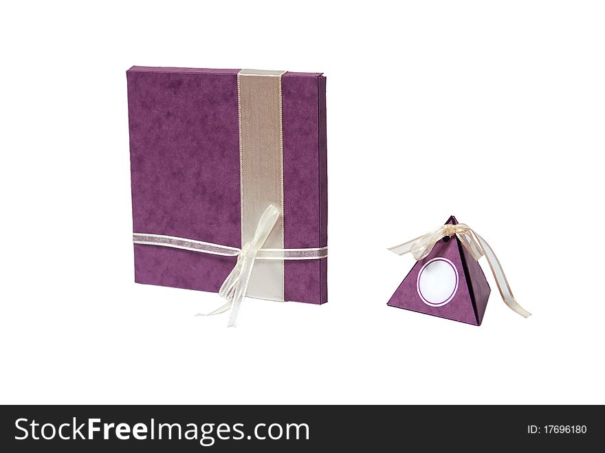 Violet gift box and invitation on white. Violet gift box and invitation on white