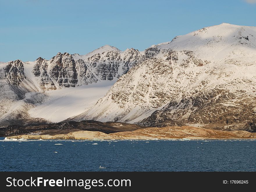 Snow And Sea In Svalbard Islands