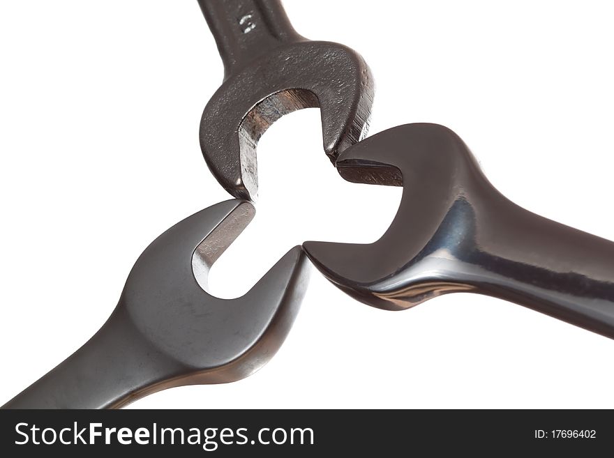 Three spanners or wrenches on white isolated background