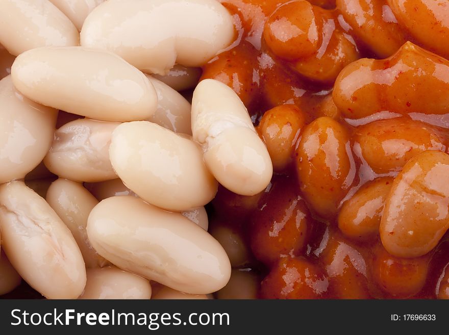 White canned beans mixed with some hot sauce. White canned beans mixed with some hot sauce.
