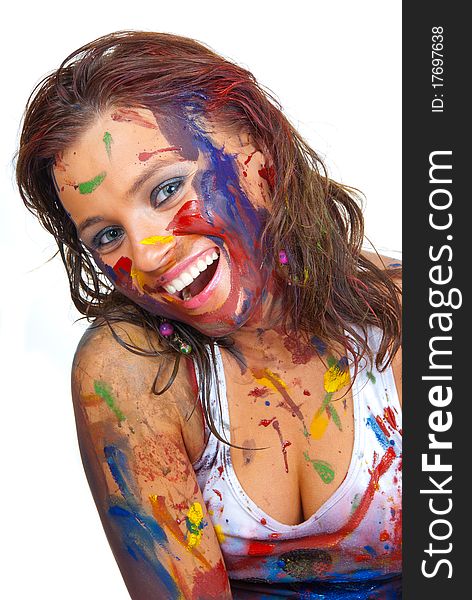 Happy girl, she is all smeared in paint. Happy girl, she is all smeared in paint