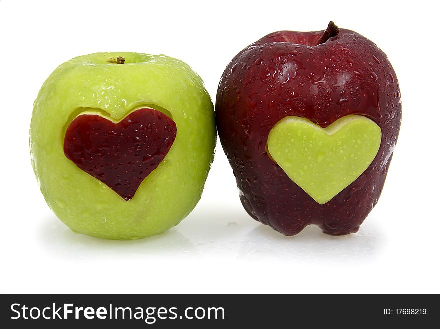 Red and Green Apple in heart shape. Red and Green Apple in heart shape