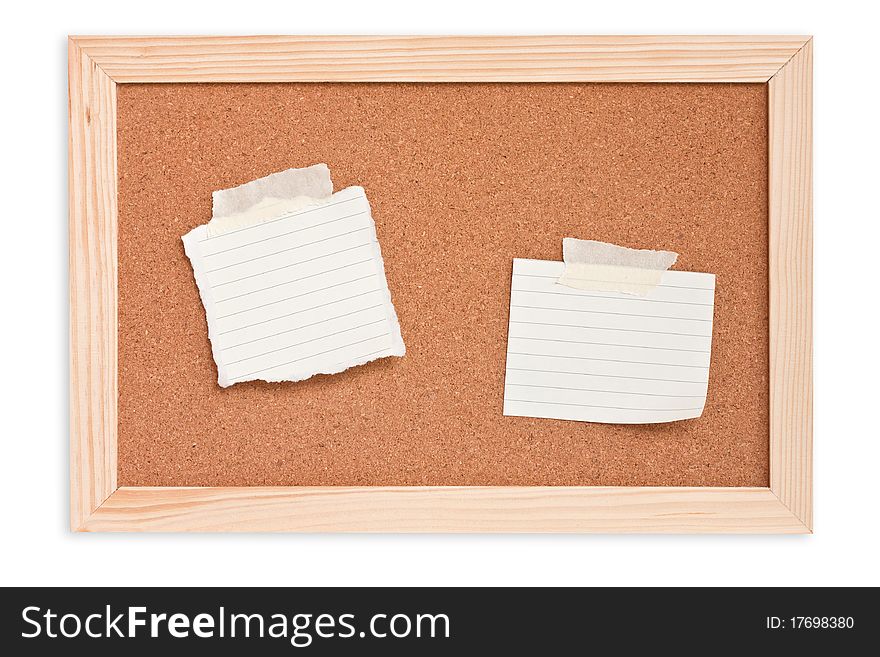 Notepad on cork board isolated