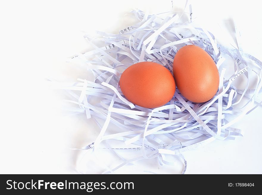 Eggs in a white nest on white background