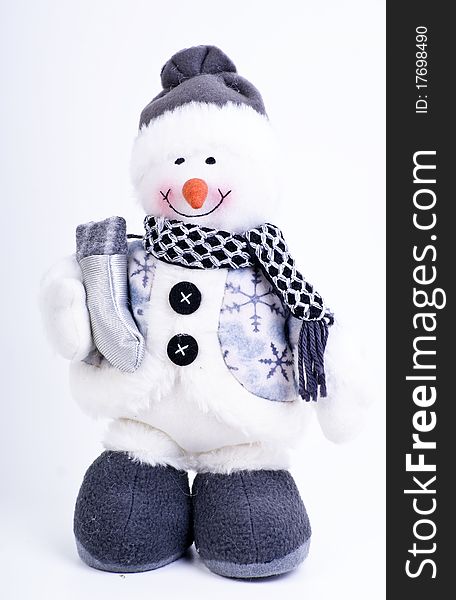 Snowman soft toy. Isolated on white background