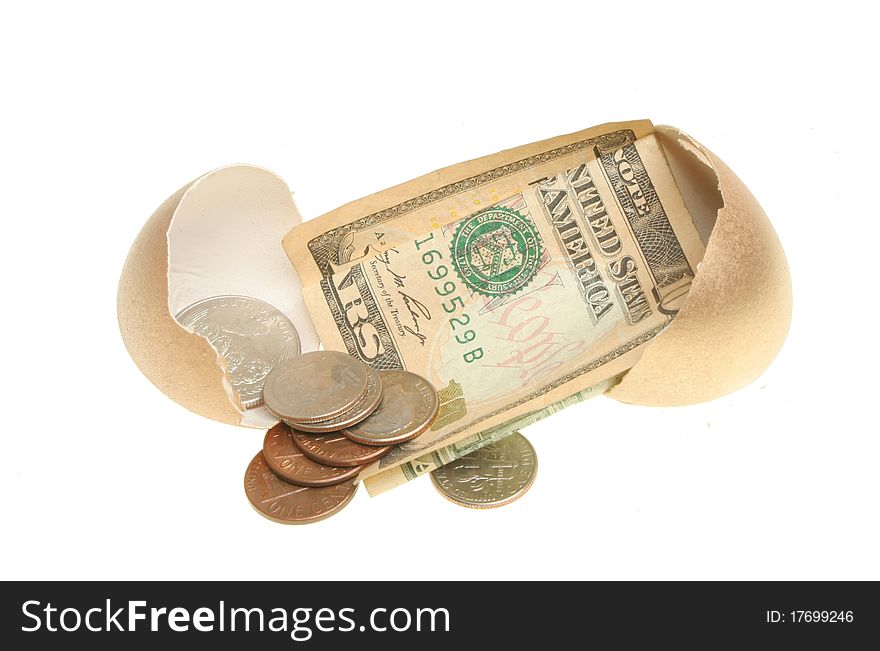 Money in a broken golden egg illustrating low savings return. Money in a broken golden egg illustrating low savings return