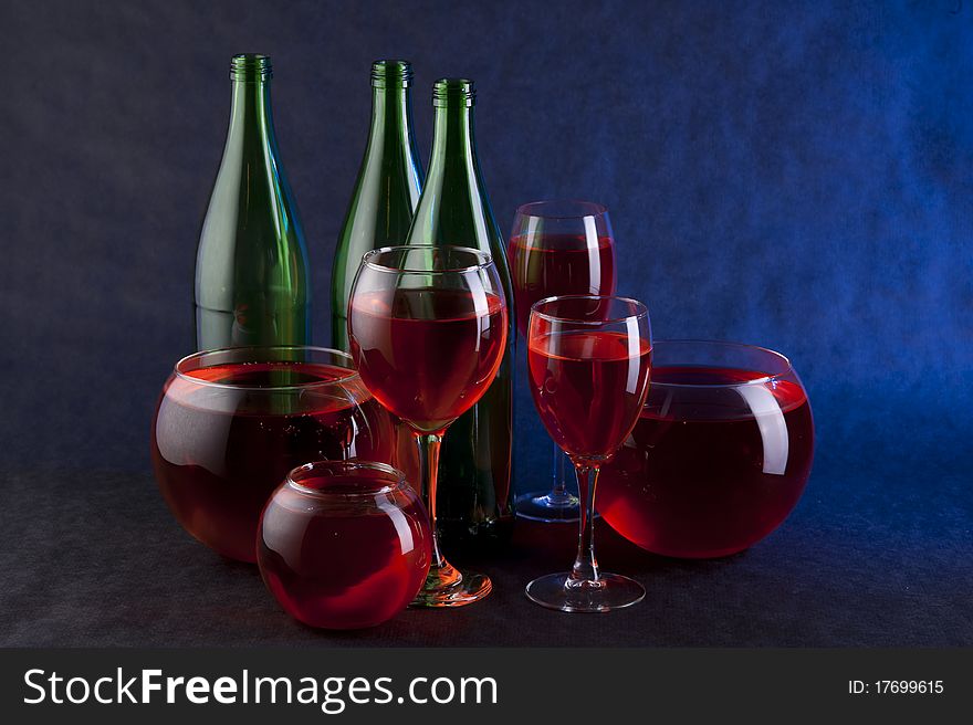 Red wine on the black background