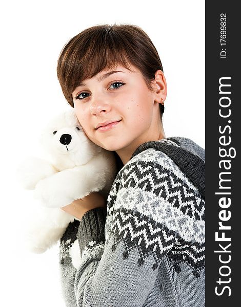 Portrait of a beautiful girl with toy  isolated on white