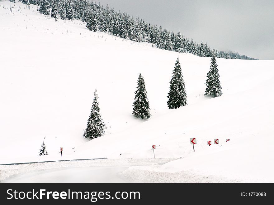 Dangerous road curves in winter time. Dangerous road curves in winter time