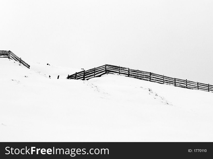 Abstract fence line in winter season