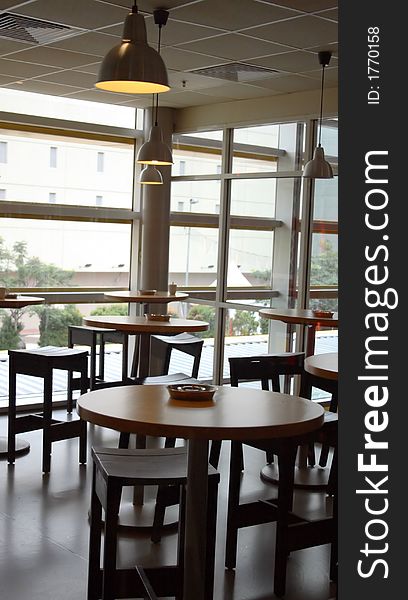 Tables with ash trays in a restaurant.