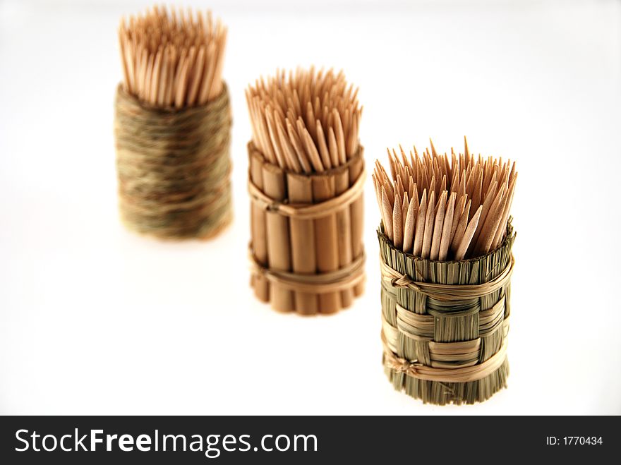 Simple wooden toothpicks with white background