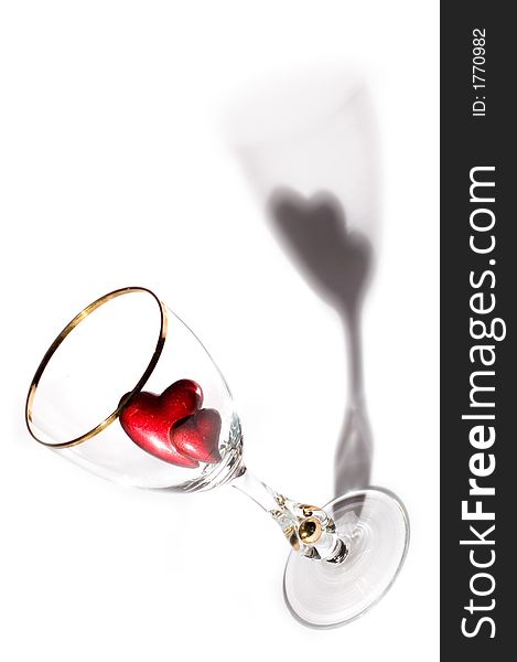 Picture of a glass with two hearts inside. Picture of a glass with two hearts inside