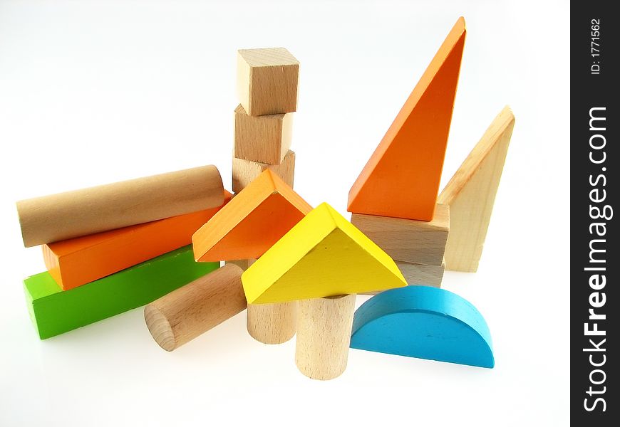 Wood color toy blocks on the white background