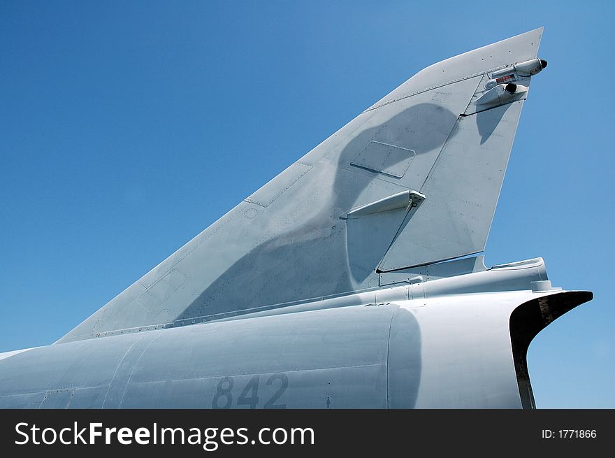 A military fighter plane's tail. A Mirage aircraft, previously used by the South African Air Force. A military fighter plane's tail. A Mirage aircraft, previously used by the South African Air Force.