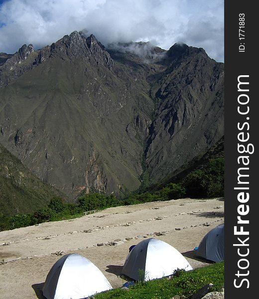 Silver tents camping on high ground