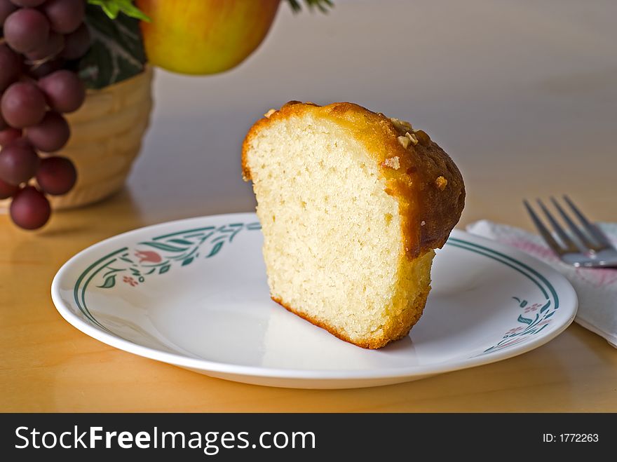 Half a banana nut muffin for a quick snack with fruit. Half a banana nut muffin for a quick snack with fruit