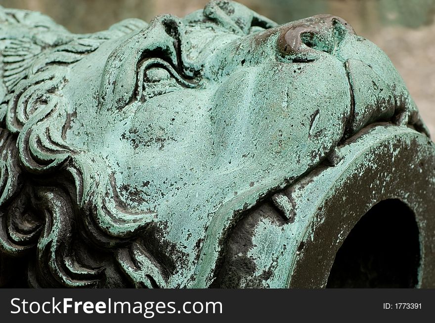 Lion on the mouth of a medieval cannon, Ingolstadt, Germany. Lion on the mouth of a medieval cannon, Ingolstadt, Germany