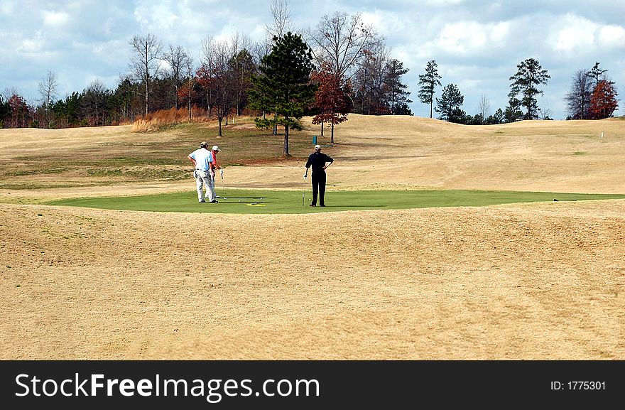 Photographed golfers at local course in Georgia.