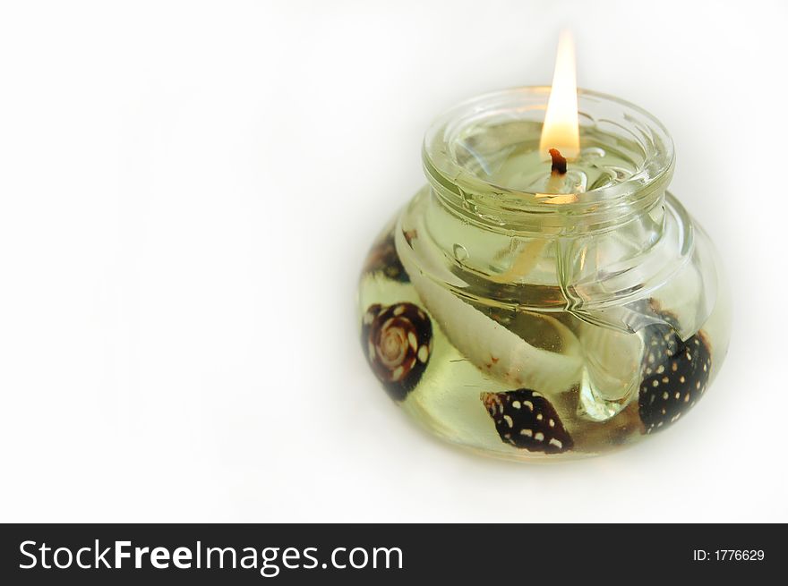 Candle light with white background sea decorations. Candle light with white background sea decorations