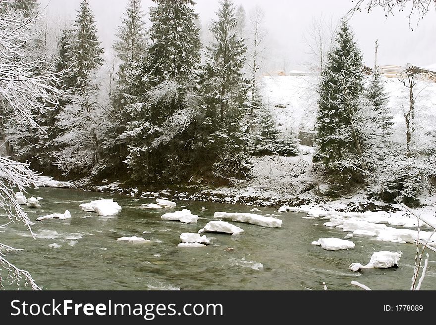 Floating ice on river in winter time