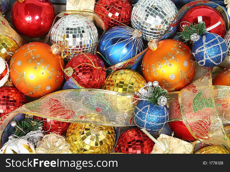 Christmas Ornaments Of Different Color And Gift Ribbons