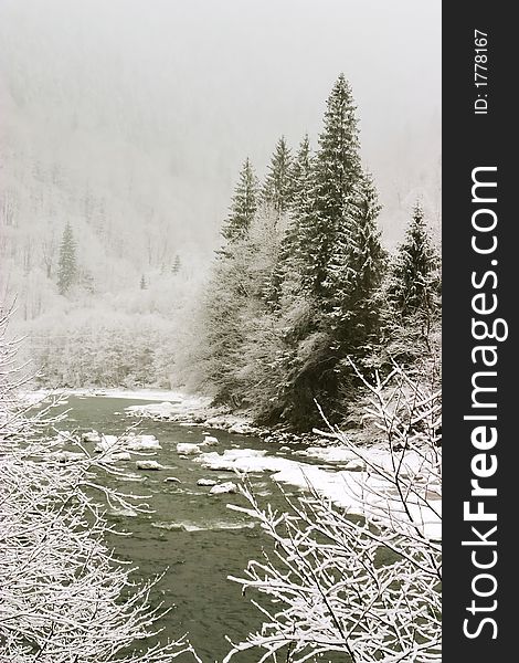 River in winter season with floating ice packs. River in winter season with floating ice packs