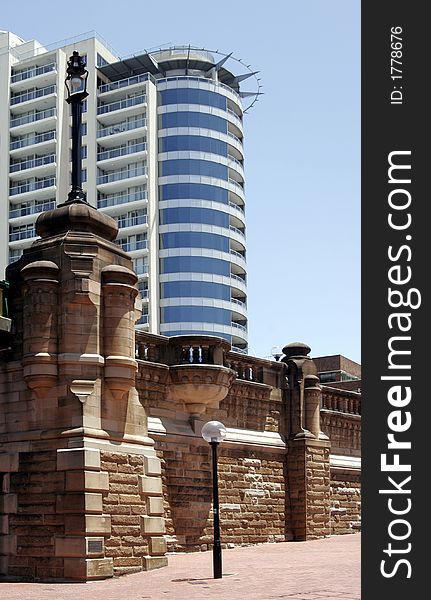 Modern Urban Building Behind An Old Brick Wall, Sydney City, Australia. Modern Urban Building Behind An Old Brick Wall, Sydney City, Australia