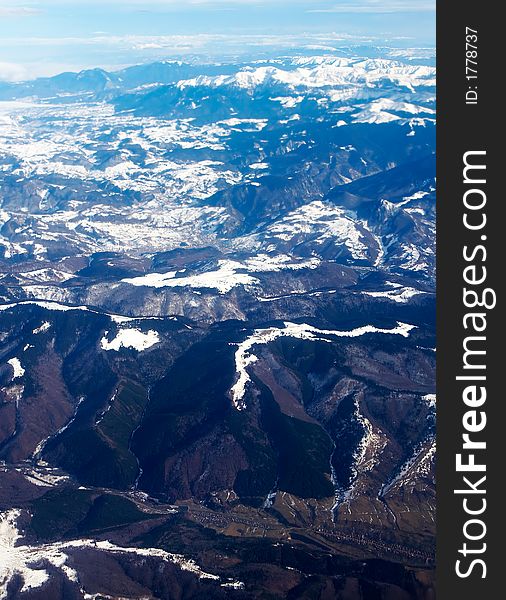 Aerial view from airplane above Romania - the carpathians mountains