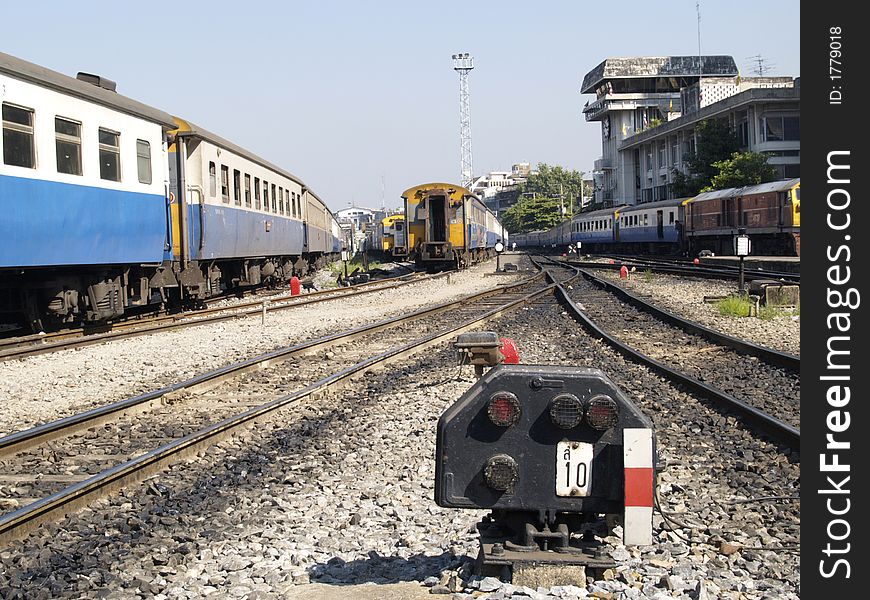 Old fashioned railway signal and trains at Hua Lampong railway station in Bangkok, Thailand