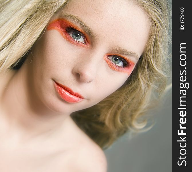 A model posing in the photo studio. A model posing in the photo studio