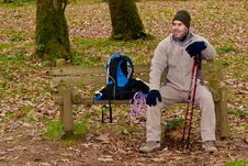 Hiker Resting On Bench Stock Photos