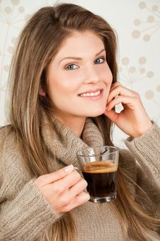 Young Girl Holding A Cup Of Coffee And Smiling Royalty Free Stock Photography Young Girl Holding A Cup Of Coffee And Smiling Royalty Free Stock Photography