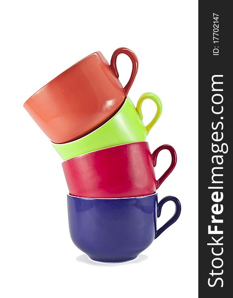 Four differently colored cups on white background. Four differently colored cups on white background
