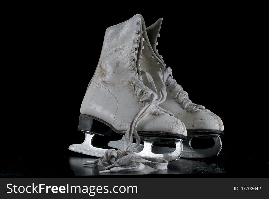 Worn tired figure skates looking for a new home. Worn tired figure skates looking for a new home