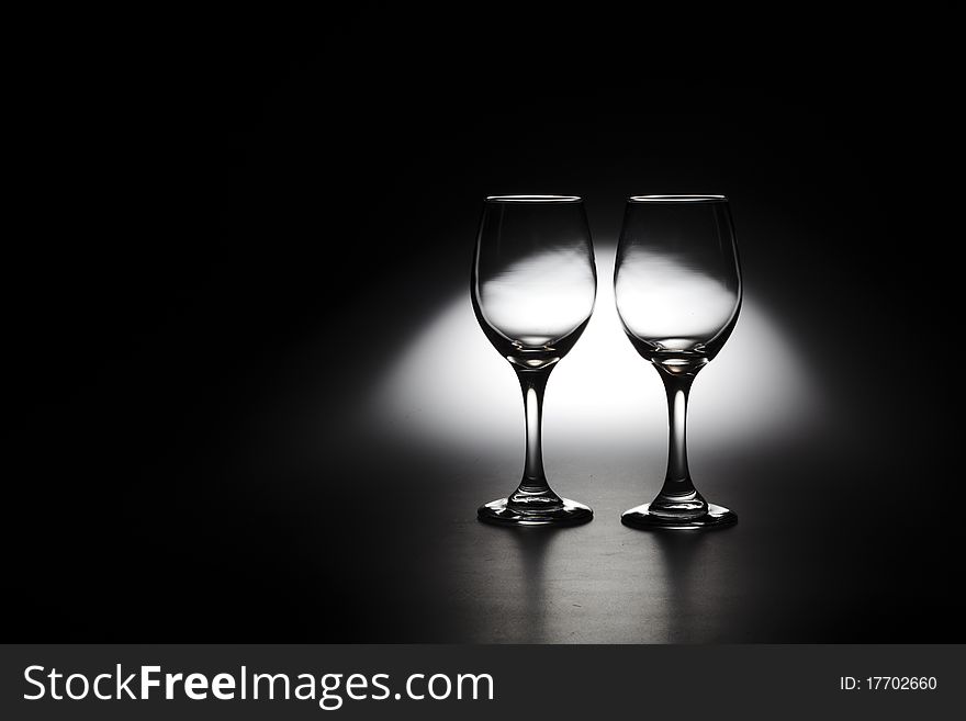 Beautiful couple of glasses with a background like moon. Beautiful couple of glasses with a background like moon