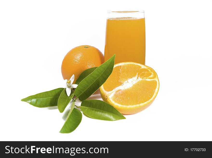 Orange with a glass of juice. Orange with a glass of juice