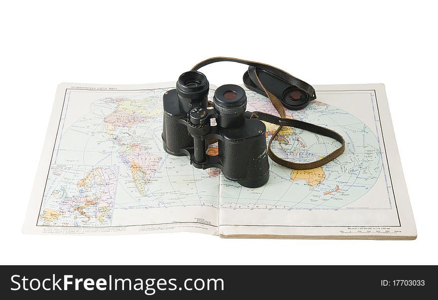 Old commander s binoculars with a map