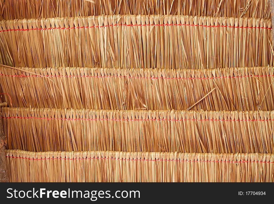 Texture of roof made from grass inside of temple hall in Thailand